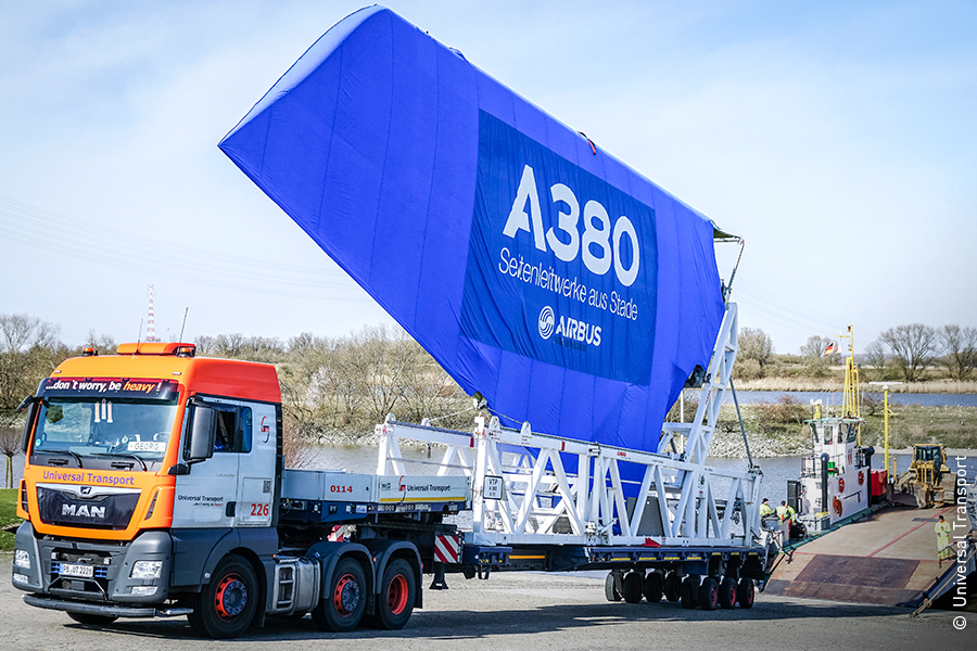 Heavy bridge components transported at night by Universal Transport